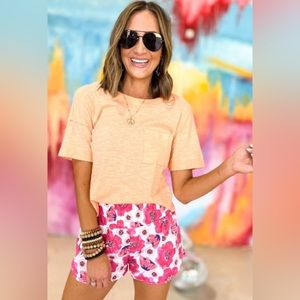 NWOT New In Front pocket T shirt with a  back detail